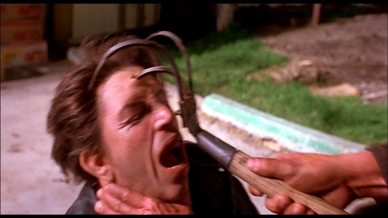Mike - Stabbed in the forehead with a garden claw - Halloween 5 The Revenge of Michael Myers (1989)