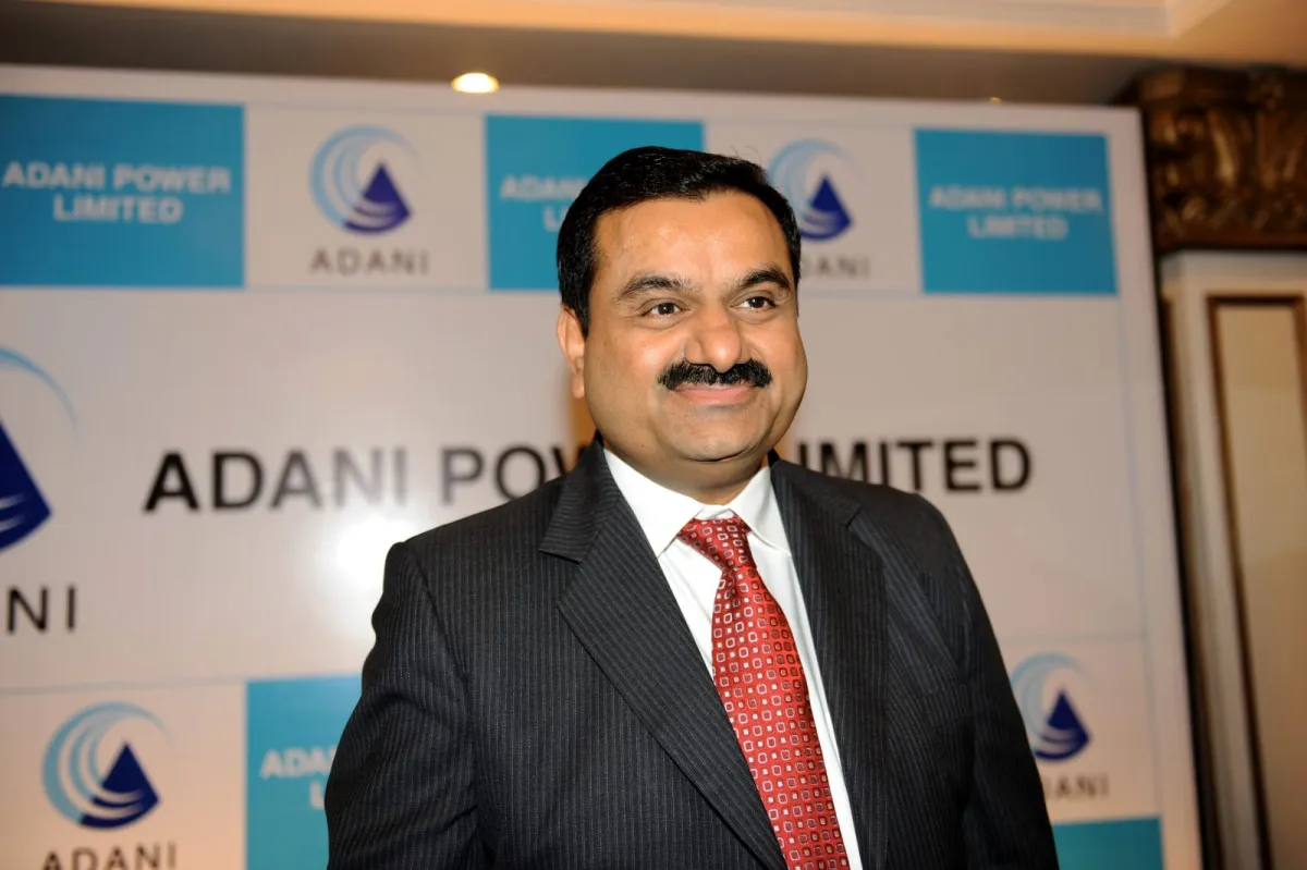 How was Mr. Adani’s early life