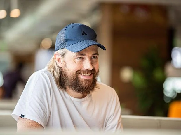 What are the other interests of Mike Cannon-Brookes