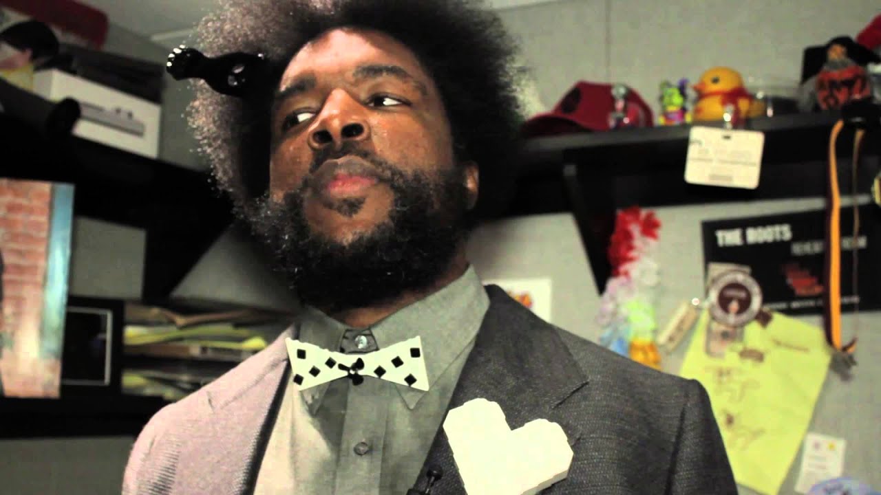 What did the early life and childhood of Questlove comprise of